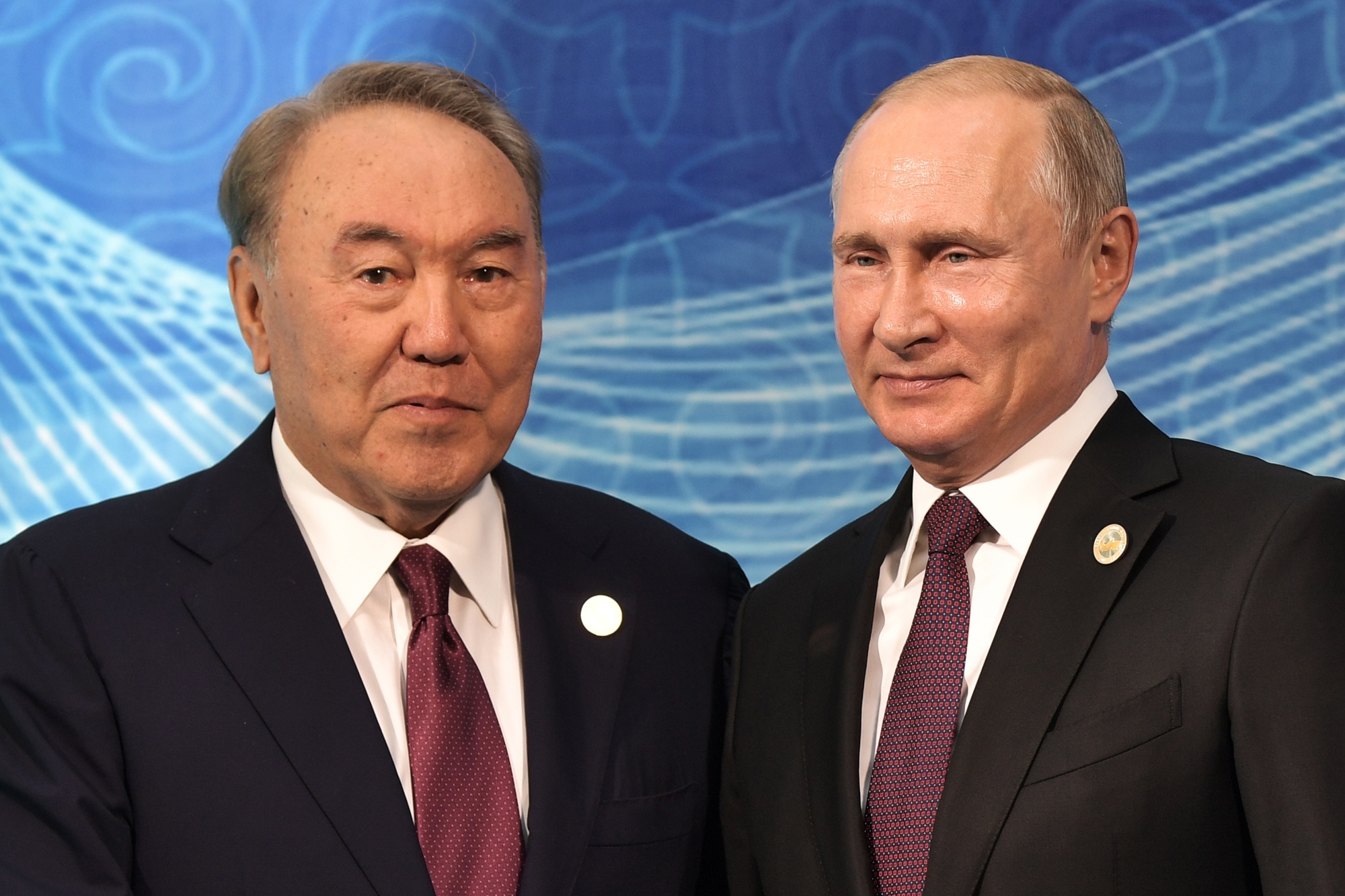 Vladimir Putin, right, with Nursultan Nazarbayev. Photographer: Alexey Nikolsky/Sputnik/AFP via Getty Images