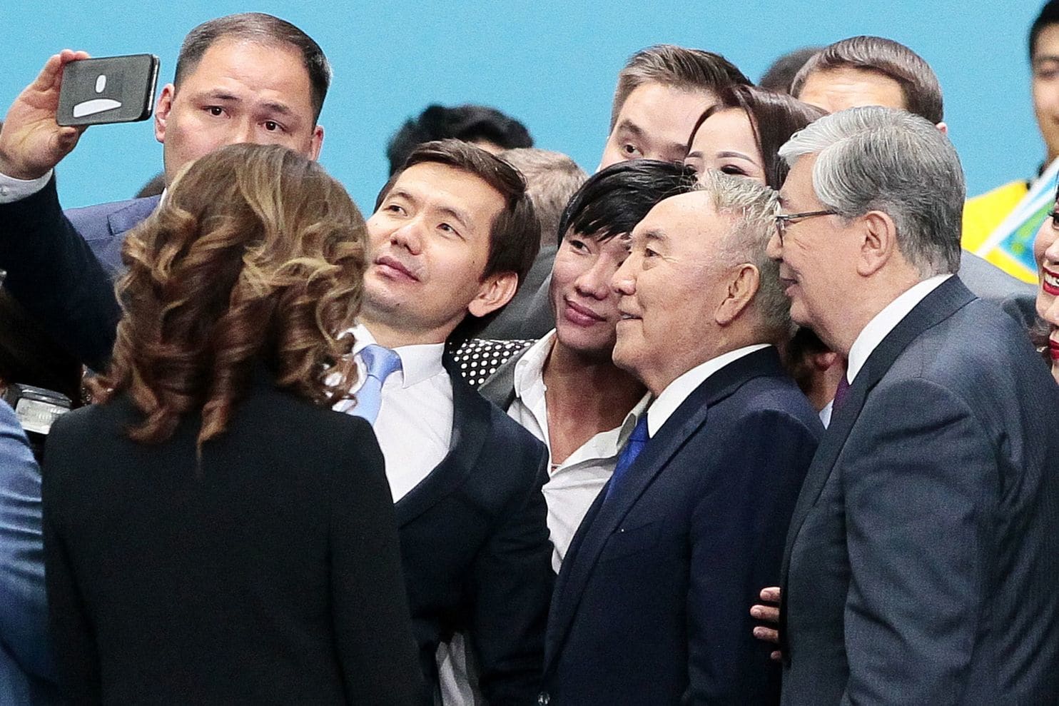 Former Kazakh president Nursultan Nazarbayev and President Kassym-Jomart Tokayev pose for photos Tuesday during a congress of the ruling party. (Stanislav Filippov/AFP/Getty Images)