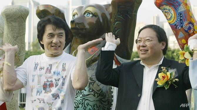 former hong kong home affairs secretary patrick ho chi ping r pictured in a 2003 photograph with movie star jackie chan has been convicted over a bribery scheme 1544047563514 2