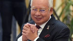 Malaysia's Najib explains why he had so many luxury handbags, lots of cash, jewellery