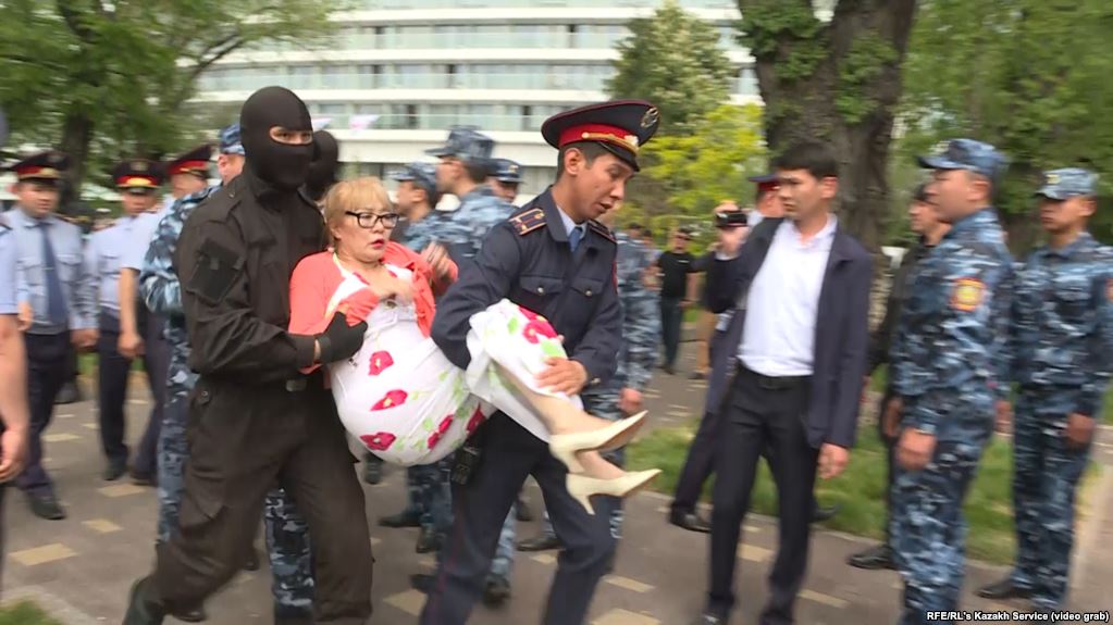 Kazakh police detain dozens at anti-government rally