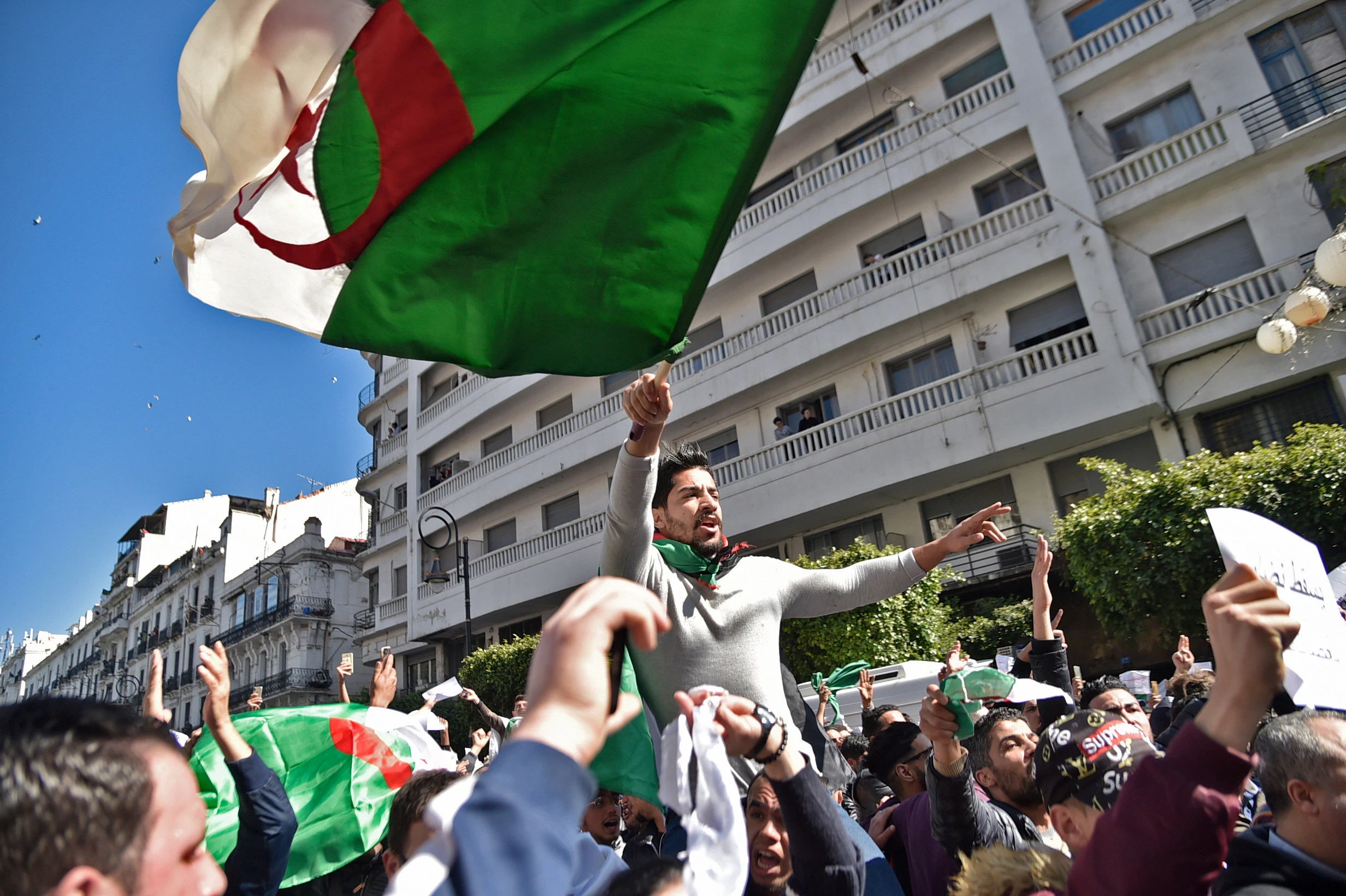 Algerians protest against former President Abdelaziz Bouteflika's bid for a fifth term in power, in Algiers on Mar. 1, 2019. RYAD KRAMDI/AFP VIA GETTY IMAGES