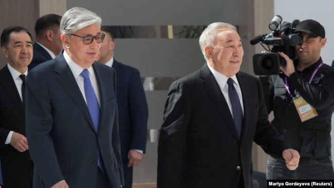 Kazakh interim President Qasym-Zhomart Toqaev (left) and former President Nursultan Nazarbaev