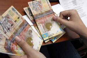 Kazakhstan Widens Currency Trading Band, Tenge Little Changed